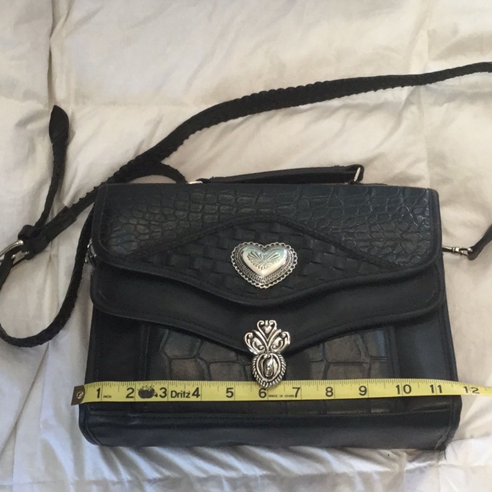 Crossbody purse with handle and wallet included.